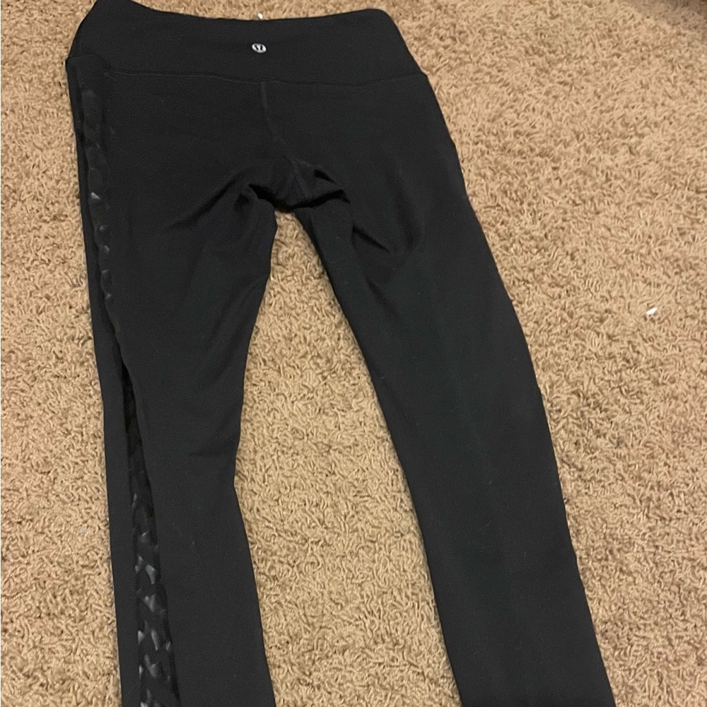 Lululemon size 4 black leggings with side design